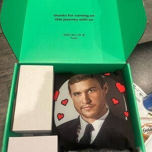 The Bachelor Hulu Gift Box w/ a Pillow, 2 Wine Glasses, Drama Button, Chocolate